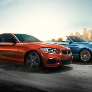 The BMW 2 Series Coupe and Convertible face off in a head to head sprint.