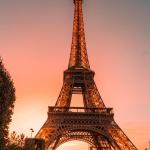 eiffel tower sunset, paris, France | Photo by Adrien on Unsplash