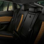 The rear seat layout in the 2021 BMW X6 M mirrors the performance-oriented nature of the cabin.
