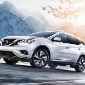 Nissan Murano Platinum AWD shown in Pearl White with silver roof rails