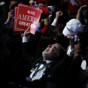 A Trump supporter celebrates as election returns come in at Republican U.S. presidential nominee Donald Trump election night rally in Manhattan New York, U.S., November 8, 2016. REUTERS/Jonathan Ernst
