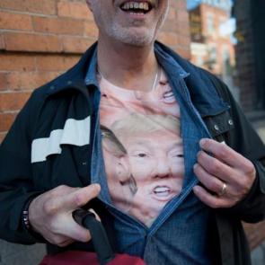 A voter displays his support for Donald Trump after voting<br />
Photograph: Tracie van Auken/EPA