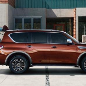 Nissan Armada Platinum® shown in Forged Copper, highlighting power liftgate