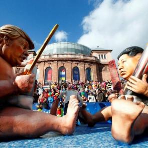  A float at the Rose Monday parade in Mainz depicts North Korean leader Kim Jong-un and US President Donald Trump in their underwear and comparing the size of their missiles Ralph Orlowski/Reuters 
