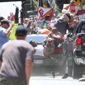 Car Attack by Ryan M. Kelly, The Daily Progress. Nominee, Spot news singles. People are thrown into the air as a car plows into a group of protesters demonstrating against the Unite the Right rally in Charlottesville in Virginia, USA.