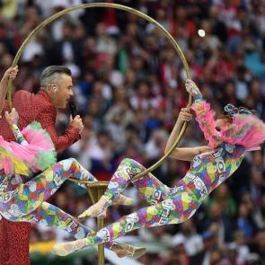 English singer Robbie Williams (C) performs during the Opening Ceremony before the Russia 2018 World Cup Group A football match between Russia and Saudi Arabia at the Luzhniki Stadium in Moscow on June 14, 2018/AFP