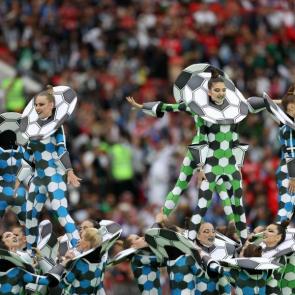 Artists perform in the centre circle.
Photograph: Lars Baron/FIFA via Getty Images