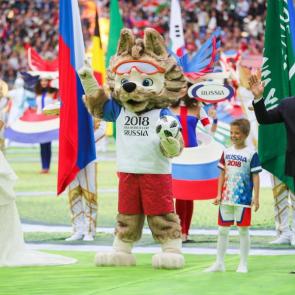Garifullina is joined by the 2018 World Cup mascot, Zabivaka, and legendary Brazilian footballer Ronaldo<br />
Photograph: Sergei Bobylev/TASS/Getty Images