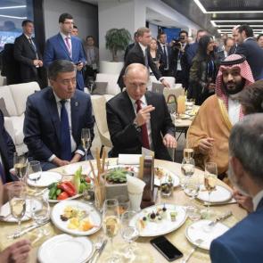 At half-time there’s no sign of a pie or a mug of Bovril as Russia’s president, Vladimir Putin, the Saudi crown prince Mohammed bin Salman and other guests have a bite to eat.
Photograph: Alexey Druzhinin/AFP/Getty Images
