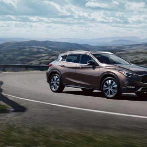 2019 INFINITI QX30 Crossover Exterior | Passenger’s side view in Chestnut Bronze, highlighting available Intelligent All-Wheel Drive
