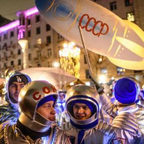 Young people dressed as Soviet cosmonauts celebrate the New Year in Moscow