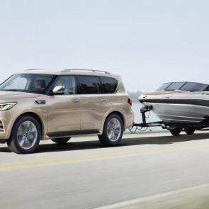 019 INFINITI QX80 LUXE 4WD Exterior | In Champagne Quartz showcasing up to 8,500 lbs towing capacity