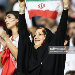 DUBAI, UNITED ARAB EMIRATES - JANUARY 16: Iranian fans cheer for their team during the AFC Asian Cup Group D match between Iran and Iraq at Al Maktoum Stadium on January 16, 2019 in Dubai, United Arab Emirates. (Photo by Amin Mohammad Jamali/Getty Images)