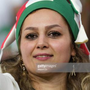 DUBAI, UNITED ARAB EMIRATES - JANUARY 16: Iranian fan smiles during the AFC Asian Cup