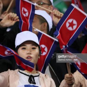 DUBAI, UNITED ARAB EMIRATES - JANUARY 08: A female fan of North Korea prior to the AFC Asian Cup