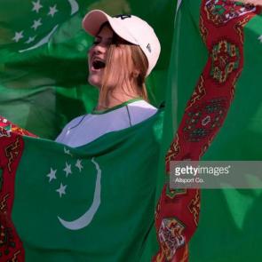 ABU DHABI, UNITED ARAB EMIRATES - JANUARY 09: A Turkmenistan fan cheers on during the AFC Asian Cup 2019