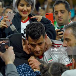 ABU DHABI, UNITED ARAB EMIRATES - JANUARY 20: Morteza Pouraliganji of Iran celebrates with the fans after victory