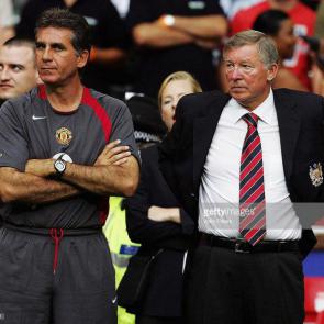 CARDIFF, WALES - AUGUST 8: Sir Alex Ferguson and Carlos Queiroz of Manchester United watch from the sidelines during the Community Shield match between Manchester United and Arsenal, at The Millennium Stadium, on August 8, 2004 in Cardiff, Wales. (Photo by John Peters/Manchester United via Getty Images)
