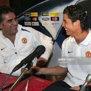 LISBON, PORTUGAL - DECEMBER 6: Cristiano Ronaldo (R) and Carlos Queiroz of Manchester United laugh as they enter the press conference at which Queiroz acted as interpreter ahead of the UEFA Champions League match between Benfica and Manchester United on December 6, 2005 in Lisbon, Portugal. (Photo by John Peters/Manchester United via Getty Images)