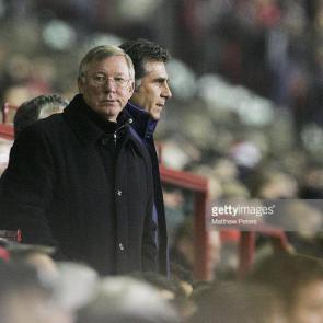 MANCHESTER, ENGLAND - NOVEMBER 22: Sir Alex Ferguson and Carlos Queiroz of Manchester United watch from the dugout during the UEFA Champions League match between Manchester United and Villarreal at Old Trafford on November 22, 2005 in Manchester, England. (Photo by Matthew Peters/Manchester United via Getty Images)