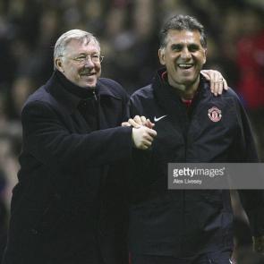 MANCHESTER, UNITED KINGDOM - APRIL 10: Manchester United Manager Sir Alex Ferguson celebrates victory with Assistant Carlos Quieiroz at the end of the UEFA Champions League Quarter Final, second leg match between Manchester United and AS Roma at Old Trafford on April 10, 2007 in Manchester, England. (Photo by Alex Livesey/Getty Images)