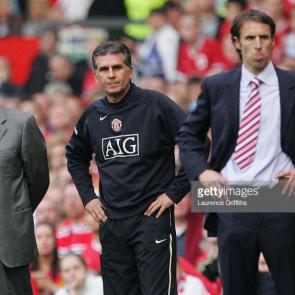 MANCHESTER, UNITED KINGDOM - APRIL 21: Manchester United Manager Sir Alex Ferguson, his Assistant Carlos Queiroz and Middlesbrough Manager Gareth Southgate watch the action from the touchline during the Barclays Premiership match between Manchester United and Middlesbrough at Old Trafford on April 21, 2007 in Manchester, England. (Photo by Laurence Griffiths/Getty Images)