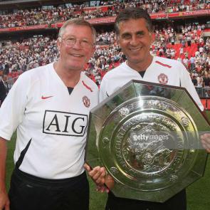 LONDON, ENGLAND - AUGUST 5: Sir Alex Ferguson and Carlos Queiroz of Manchester United pose with the Community Shield after winning the pre-season friendly match between Chelsea and Manchester United at Wembley Stadium on August 5 2007 in London, England. (Photo by John Peters/Manchester United via Getty Images)
