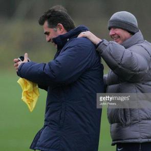 MANCHESTER, ENGLAND - JANUARY 13: Sir Alex Ferguson of Manchester United shares a joke with Carlos Queiroz during a first team training session at Carrington Training Ground on January 13 2006, in Manchester, England. (Photo by John Peters/Manchester United via Getty Images)
