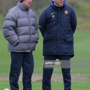 MANCHESTER, ENGLAND - JANUARY 13: Sir Alex Ferguson and Carlos Queiroz of Manchester United watch from the sidelines during a first team training session at Carrington Training Ground on January 13 2006, in Manchester, England. (Photo by John Peters/Manchester United via Getty Images)