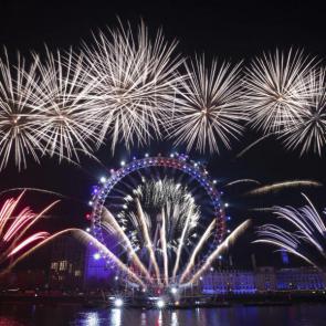 Fireworks explode over the London Eye by the River Thames in London.Matt Dunham/AP