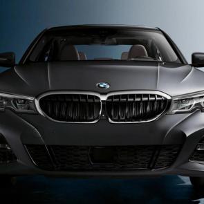 The iconic front kidney grille and aerodynamic front bumper design of the BMW 330i with the M Sport package