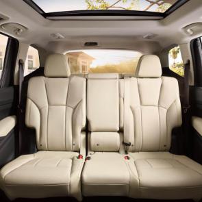 Limited 8-passenger second-row bench seat shown in Warm Ivory Leather