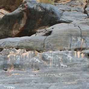 Petroglyphs are etched into the walls of Wadi Bani Kharus © Jenny Walker / Lonely Planet