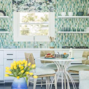 #11  Aqua Accents
Speaking of aqua hues, designer Christine Markatos Lowe is likewise predicting a resurgence of the midcentury-favorite shade for both cabinetry and tile applications.