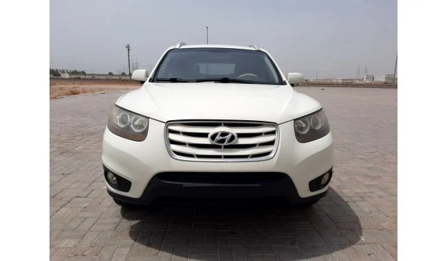 Hyundai Santa Fe 2009 full option سفید در دبی امارات
